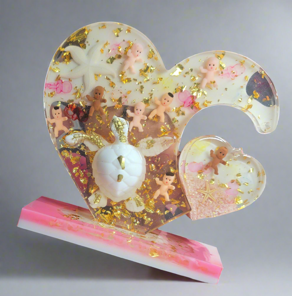 Double coeur sur socle en résine (1 pcs)